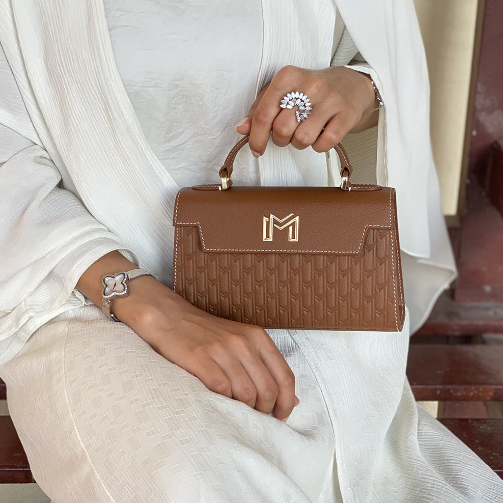 شنطة اليد حصة / تان