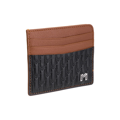 جلد الجمل أسود مع تان / فضي