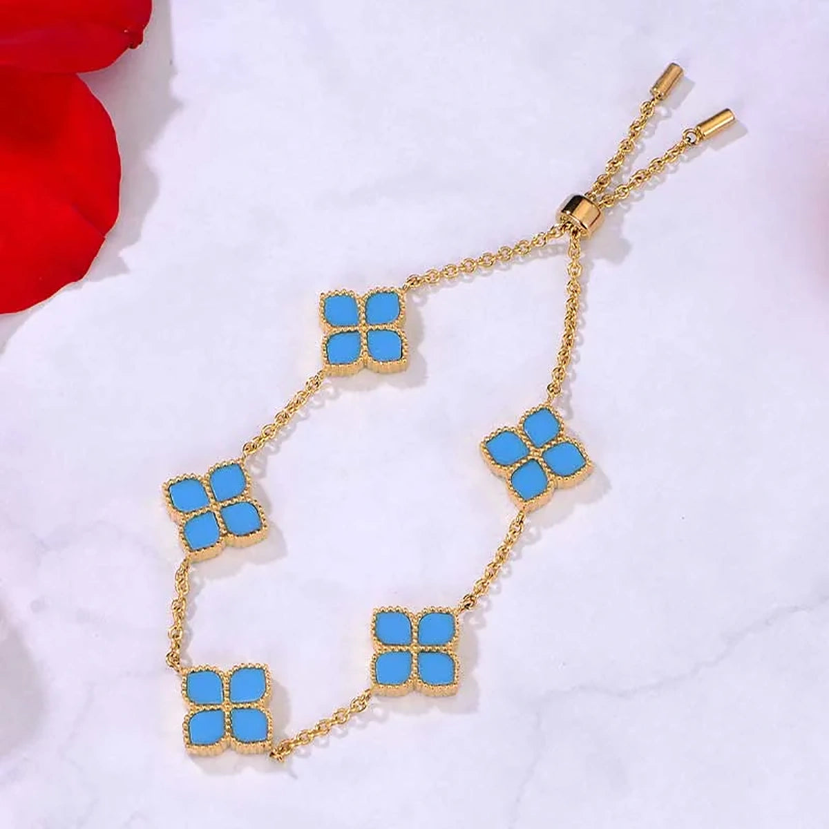 جوري / إسورة العقيق التركوازي باللون الذهبي