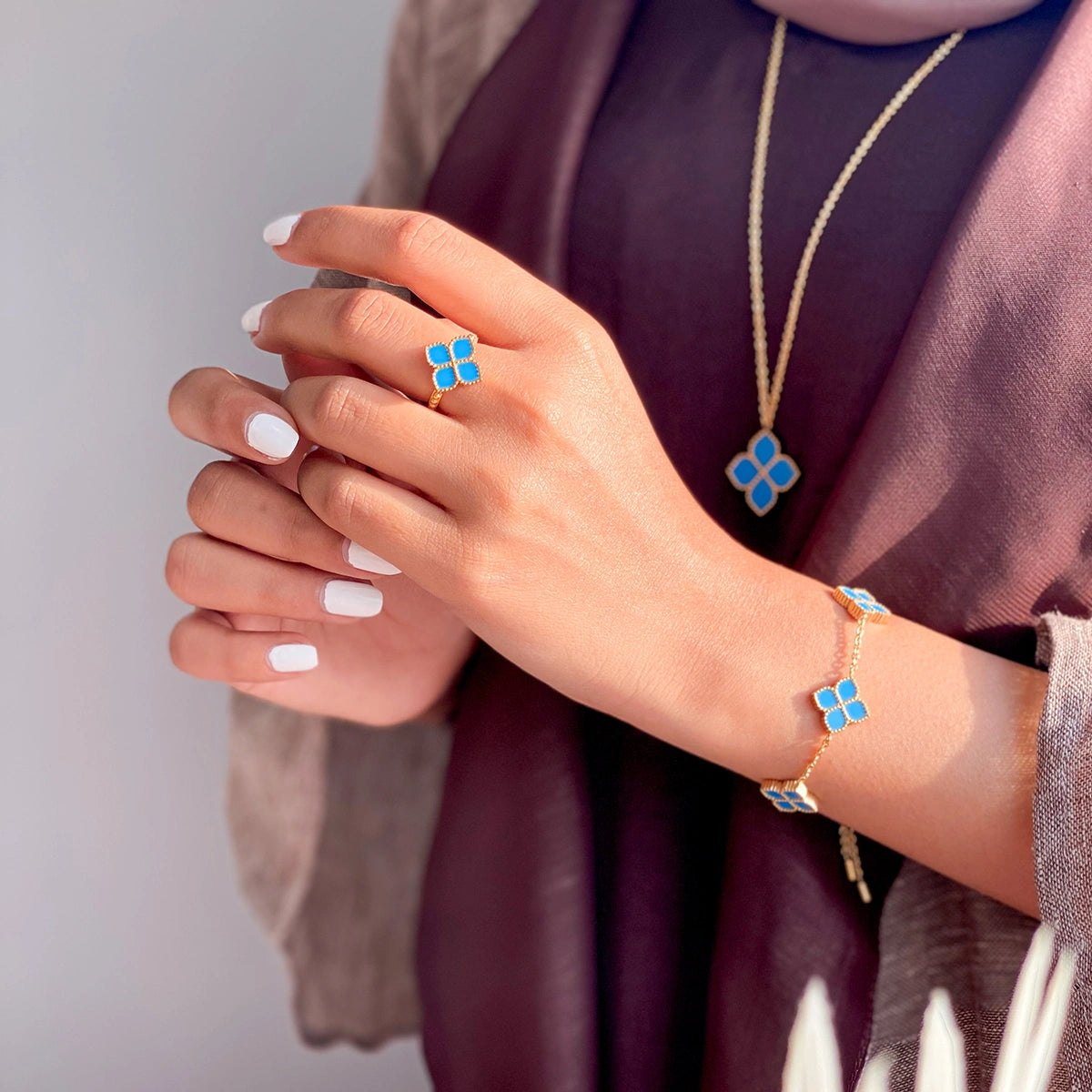 جوري / إسورة العقيق التركوازي باللون الذهبي