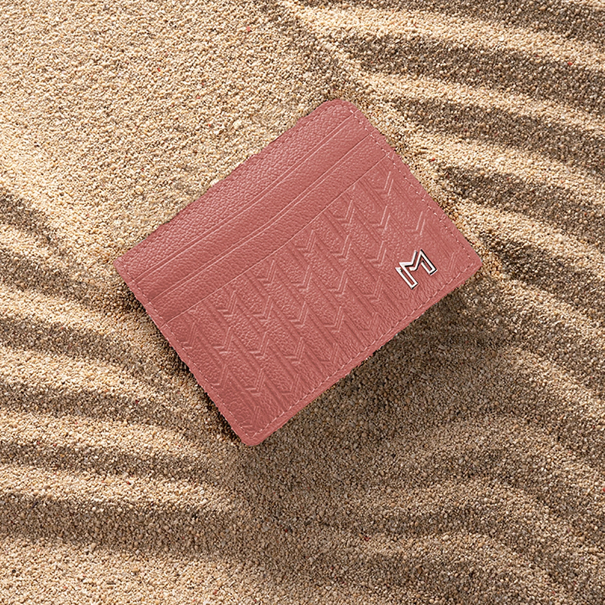 جلد الجمل وردي / فضي