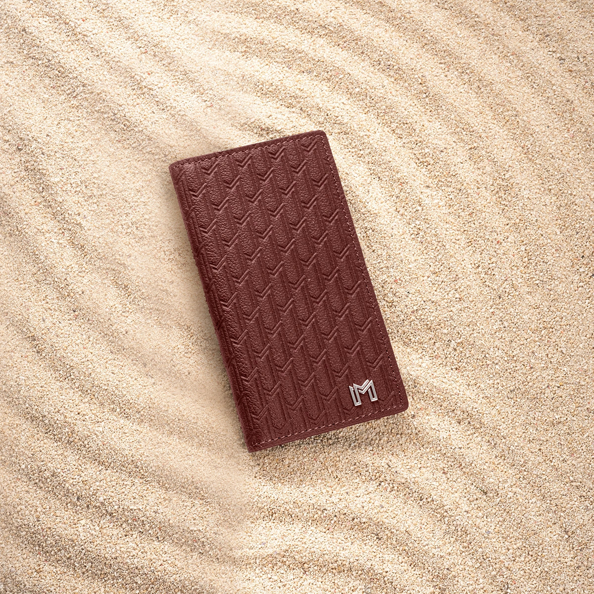 جلد الجمل بورغندي / فضي