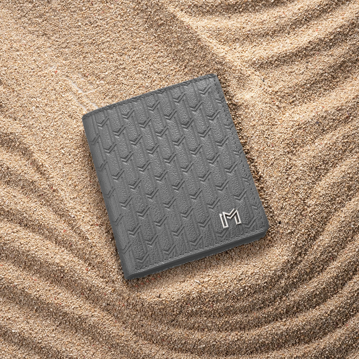 جلد الجمل رمادي / فضي