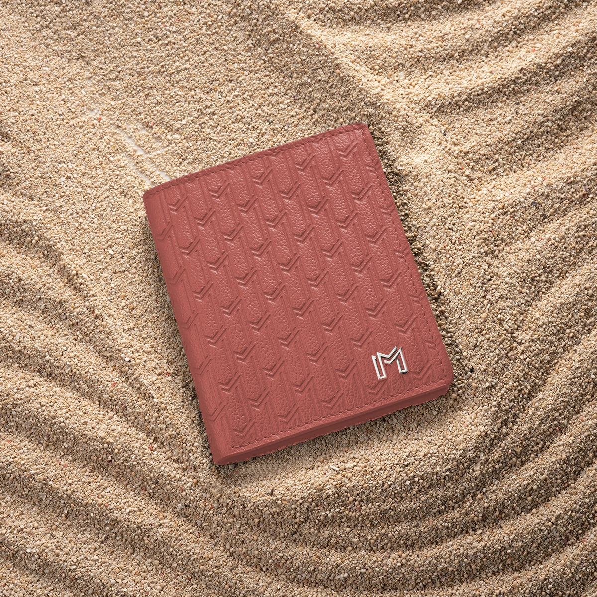 جلد الجمل وردي / فضي