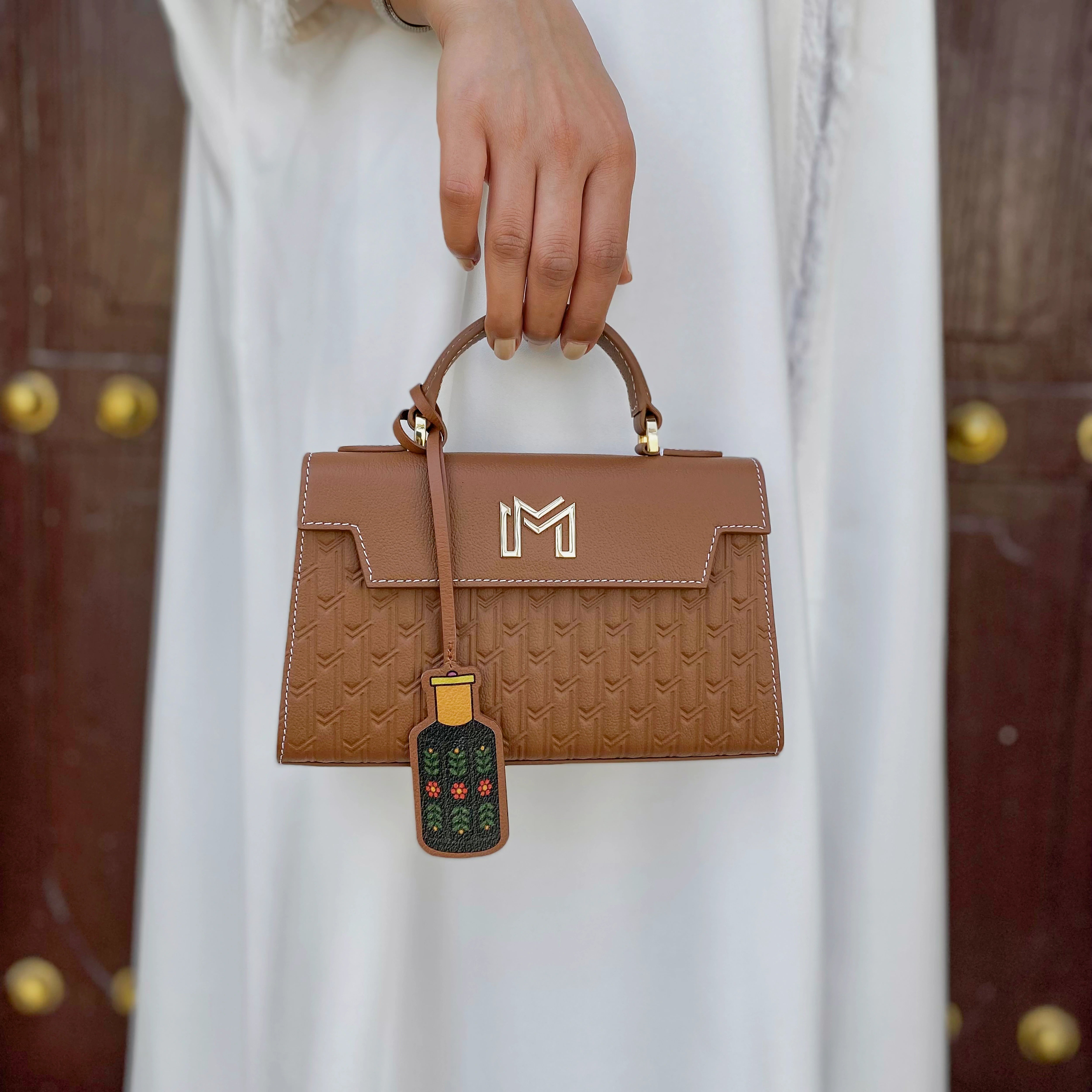 ليذر تشارم / دهن العود