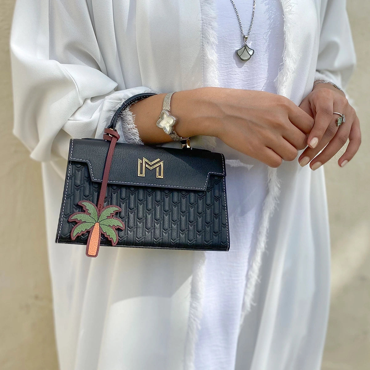 ليذر تشارم / النخلة