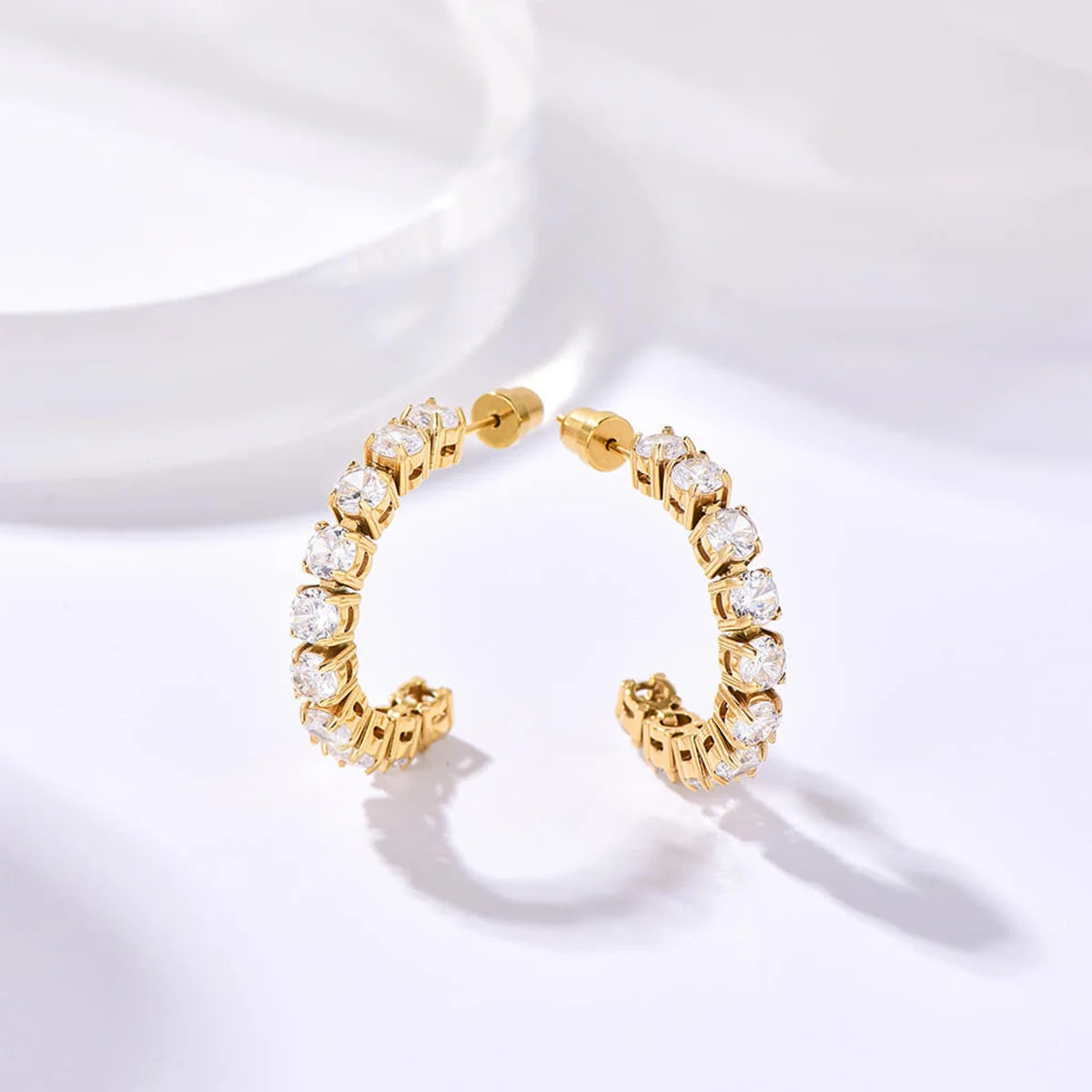 تنس / أقراط باللون الذهبي